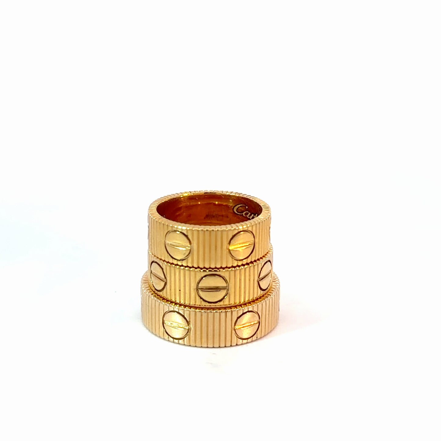 Yellow Gold Ribbed Stackable Rings with Screw Motifs