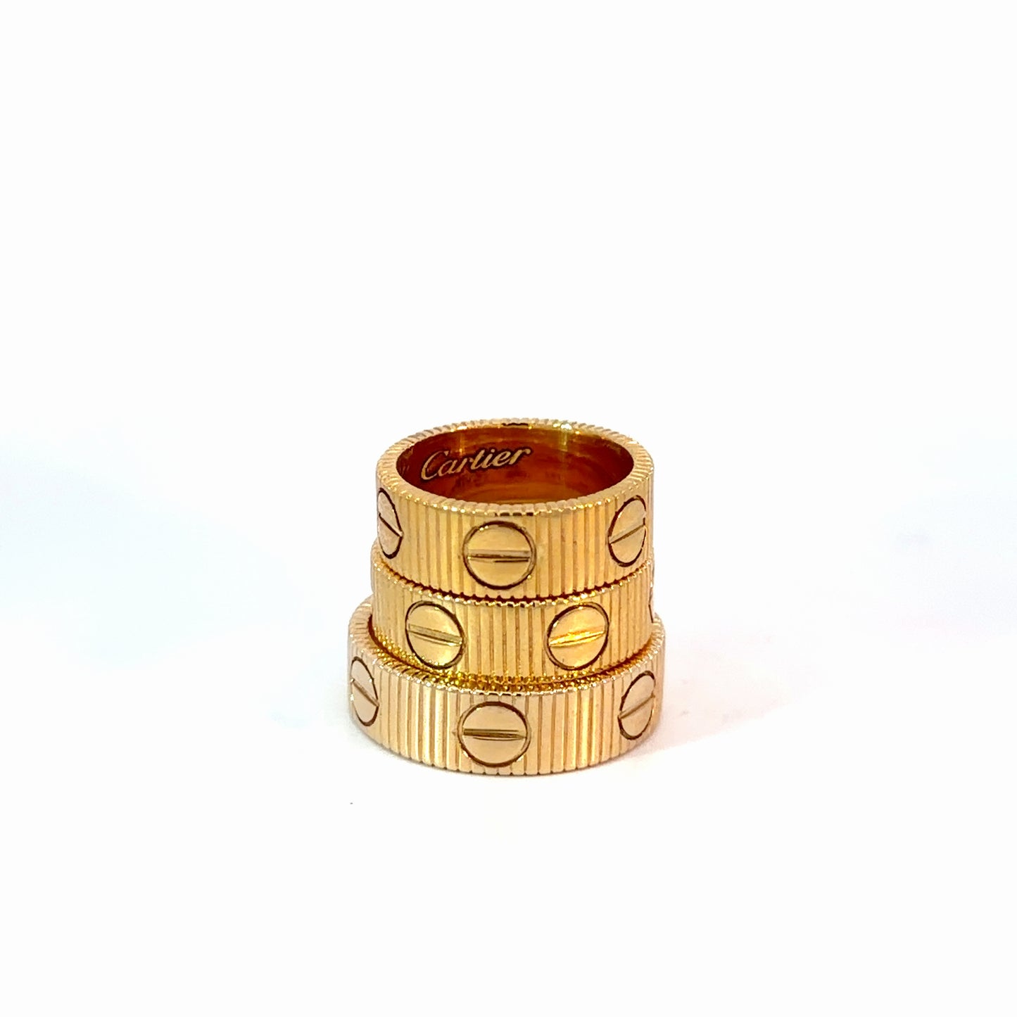 Yellow Gold Ribbed Stackable Rings with Screw Motifs