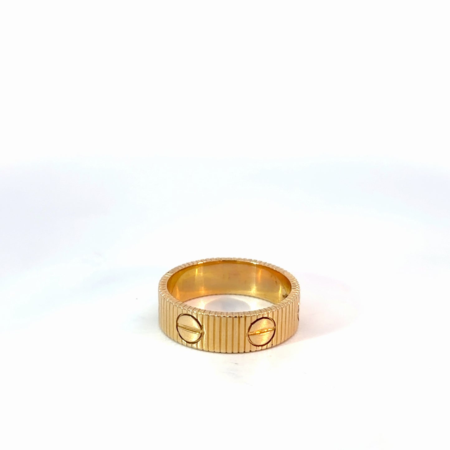 Yellow Gold Ribbed Stackable Rings with Screw Motifs