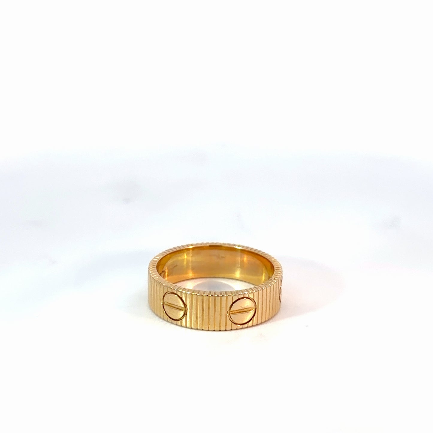 Yellow Gold Ribbed Stackable Rings with Screw Motifs
