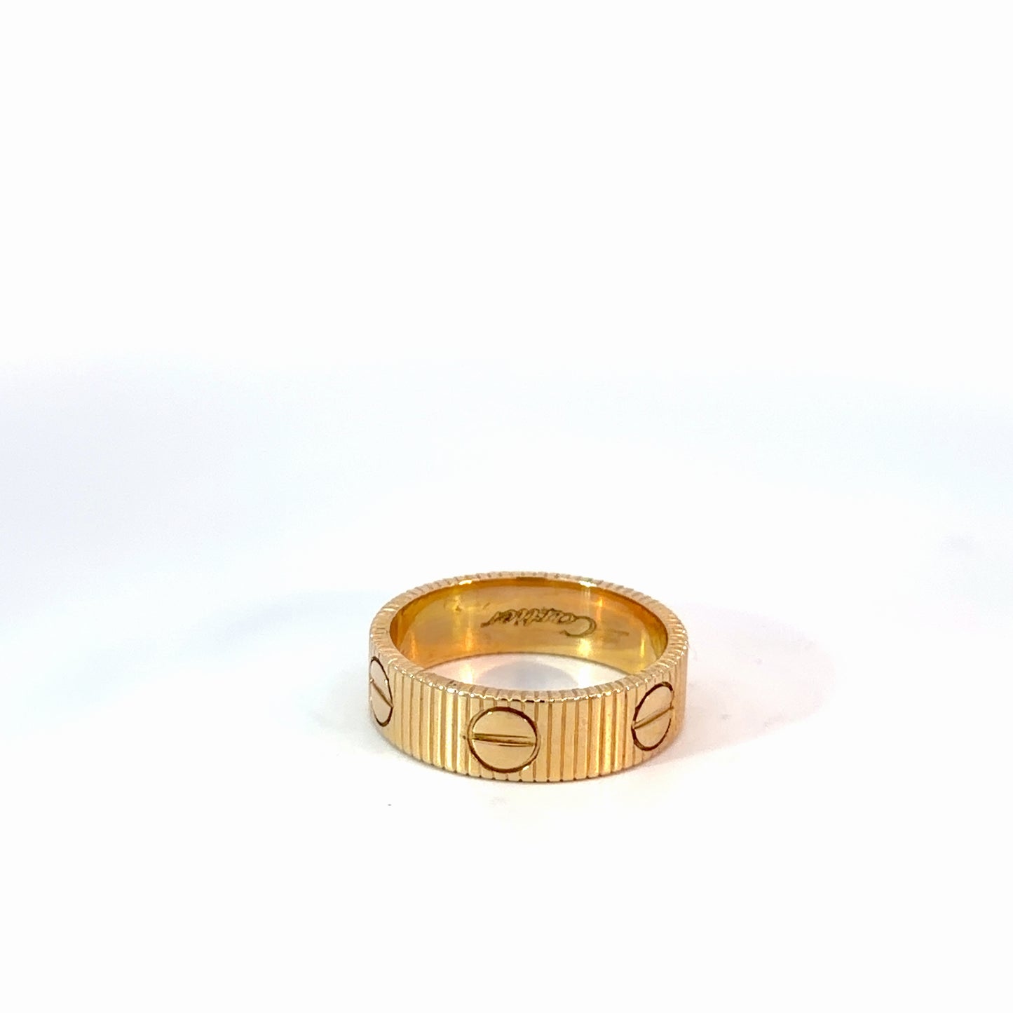 Yellow Gold Ribbed Stackable Rings with Screw Motifs